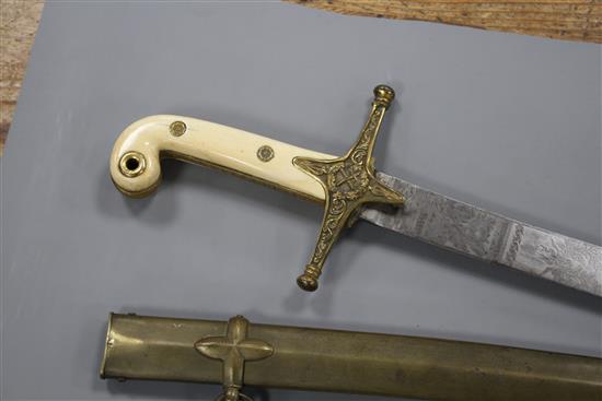 A Victorian general officers mameluke sword, gilt hilt, ivory grips, the etched blade by Ranken & Co. Calcutta, brass scabbard, blade